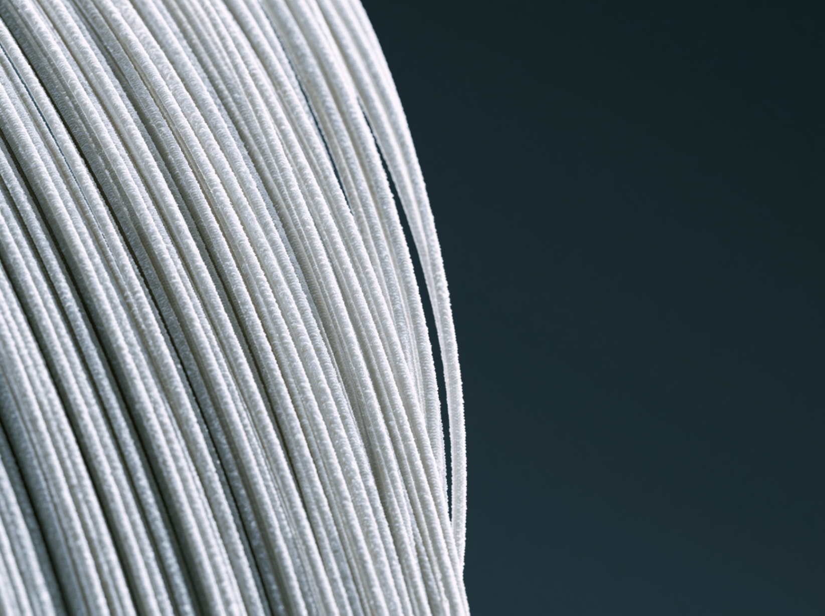 White elastic fiber strands