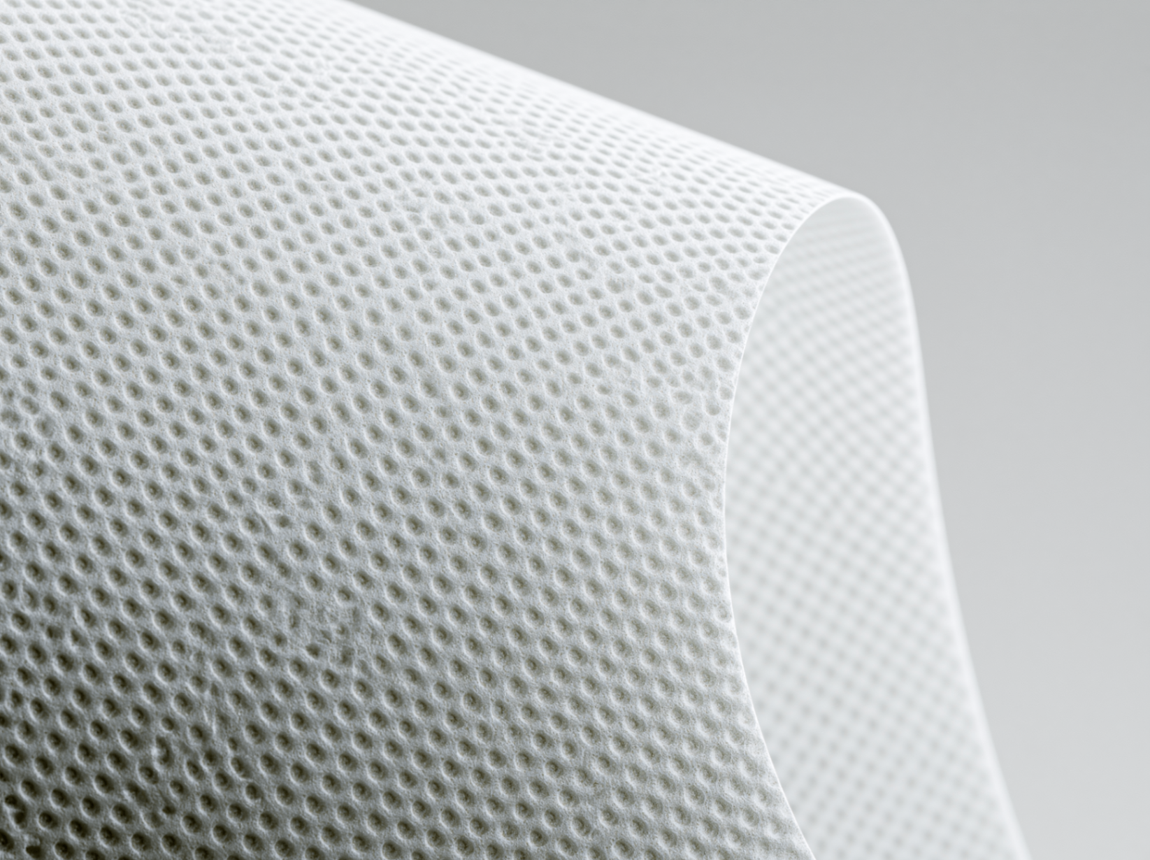 Perforated nonwoven film