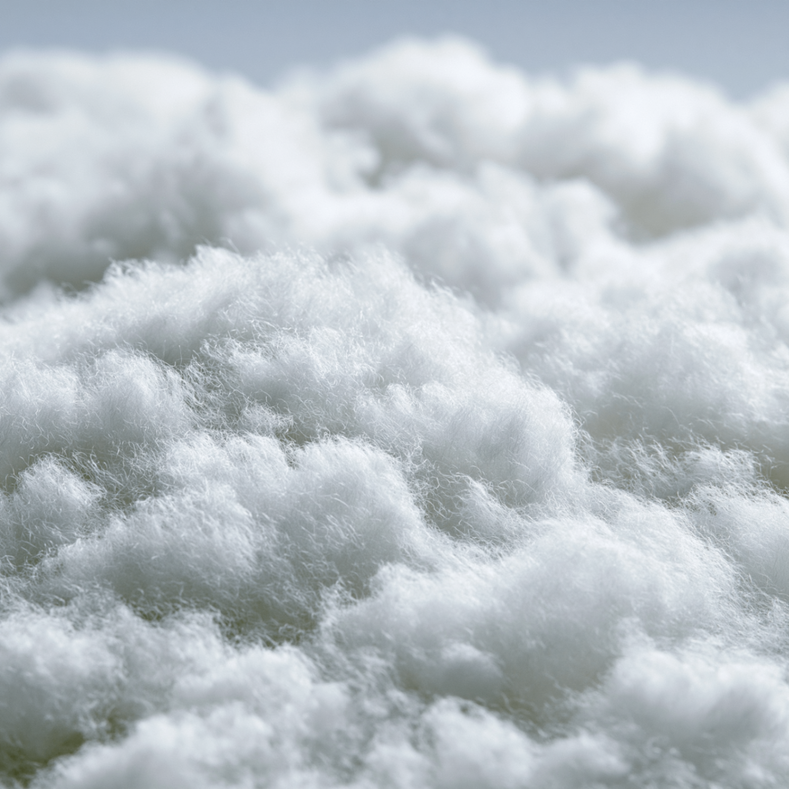 Cloud of fine white polyester fibers